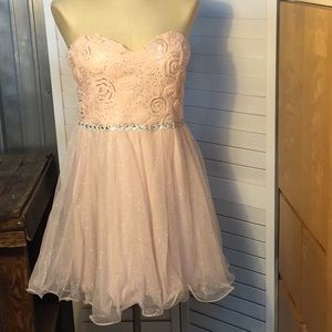 City Triangles blush cocktail dress.